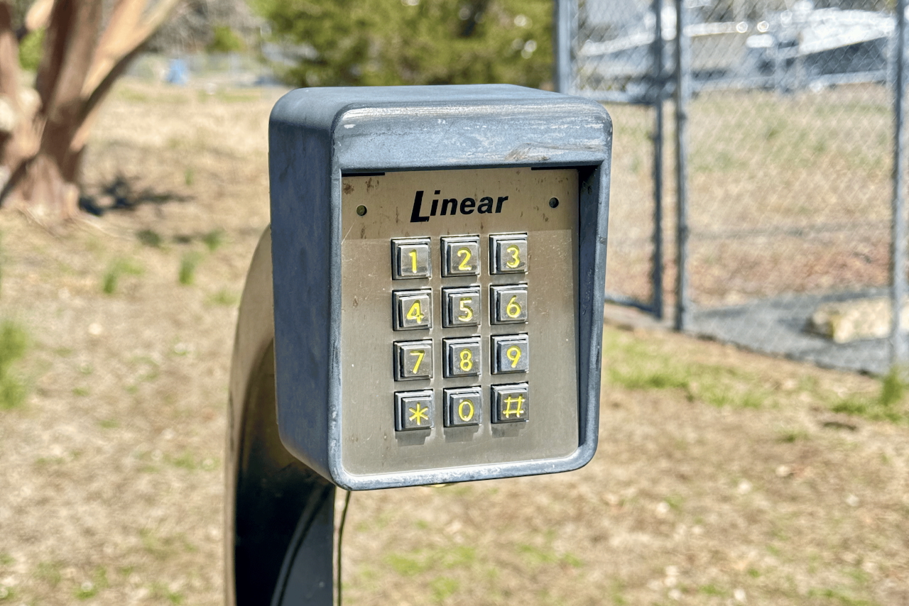 Code access gate securing Bishopville MD storage facility